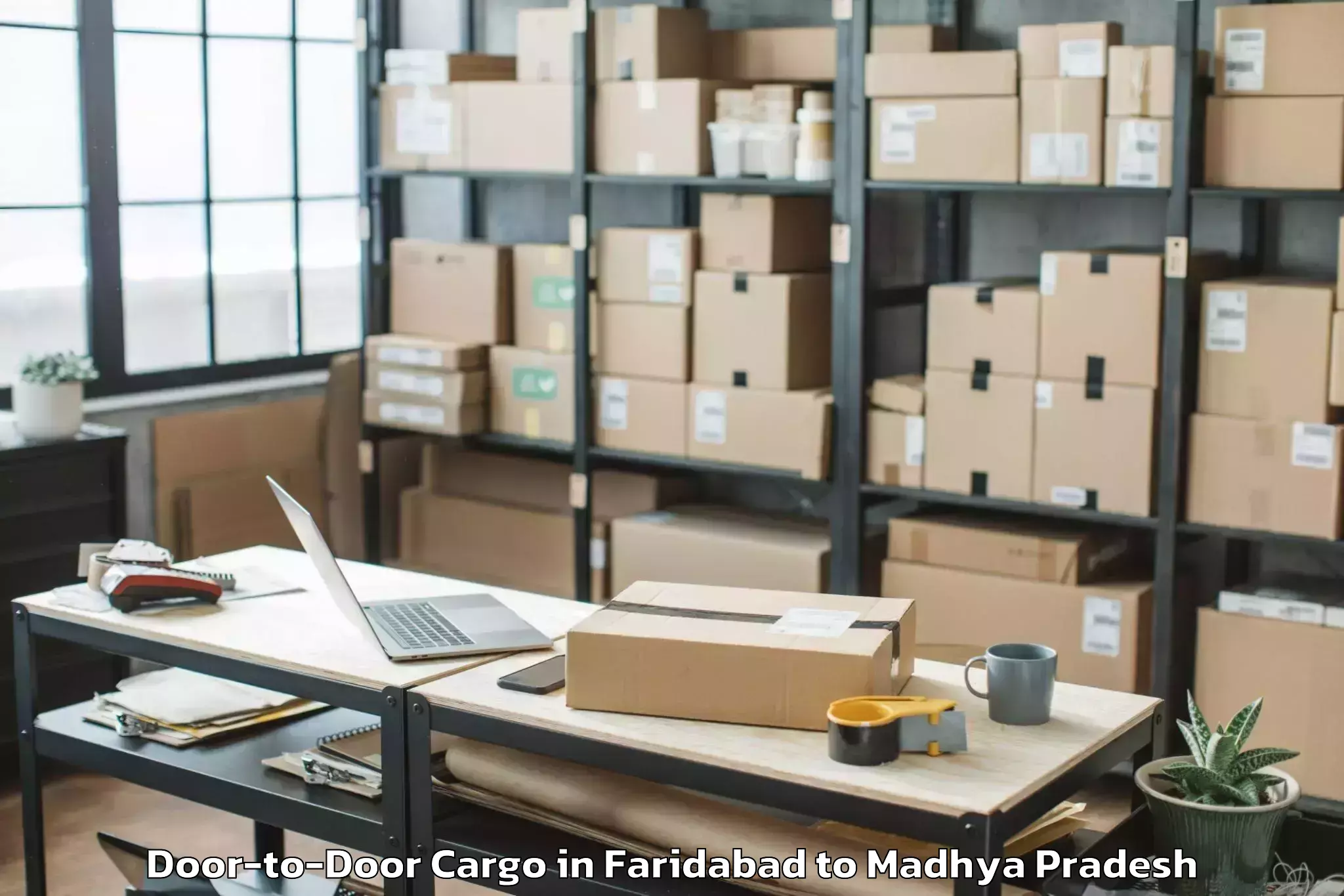 Book Faridabad to Nasrullahganj Door To Door Cargo Online